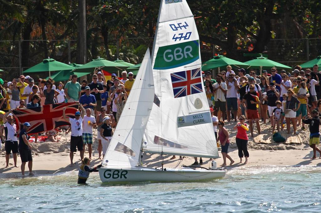 British 470 Gold Medal winners greet their fans on the beach at Rio de Janeiro © Richard Gladwell www.photosport.co.nz